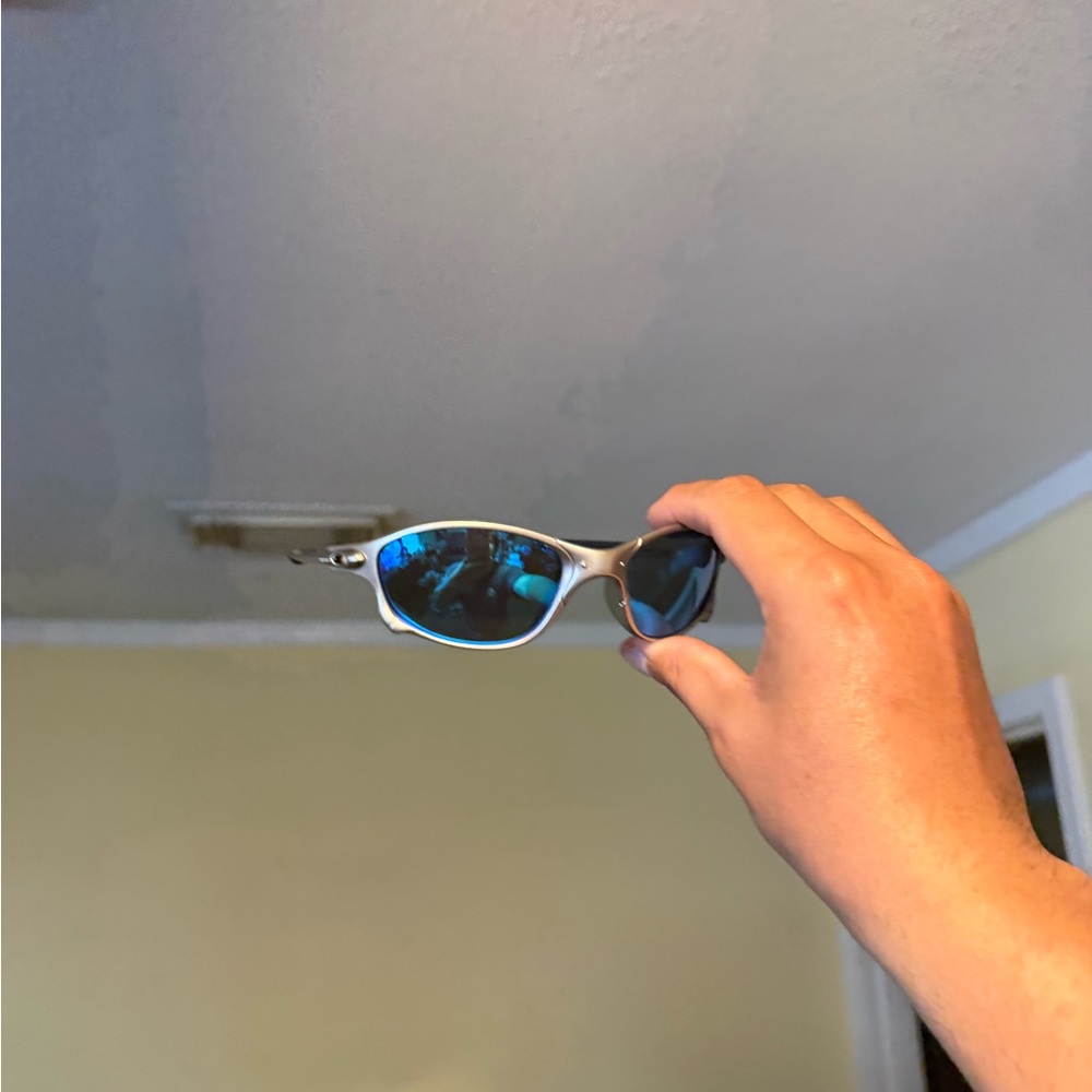 Silver Frame Sunglasses with Blue Mirrored Lenses Oakley Oakleys
